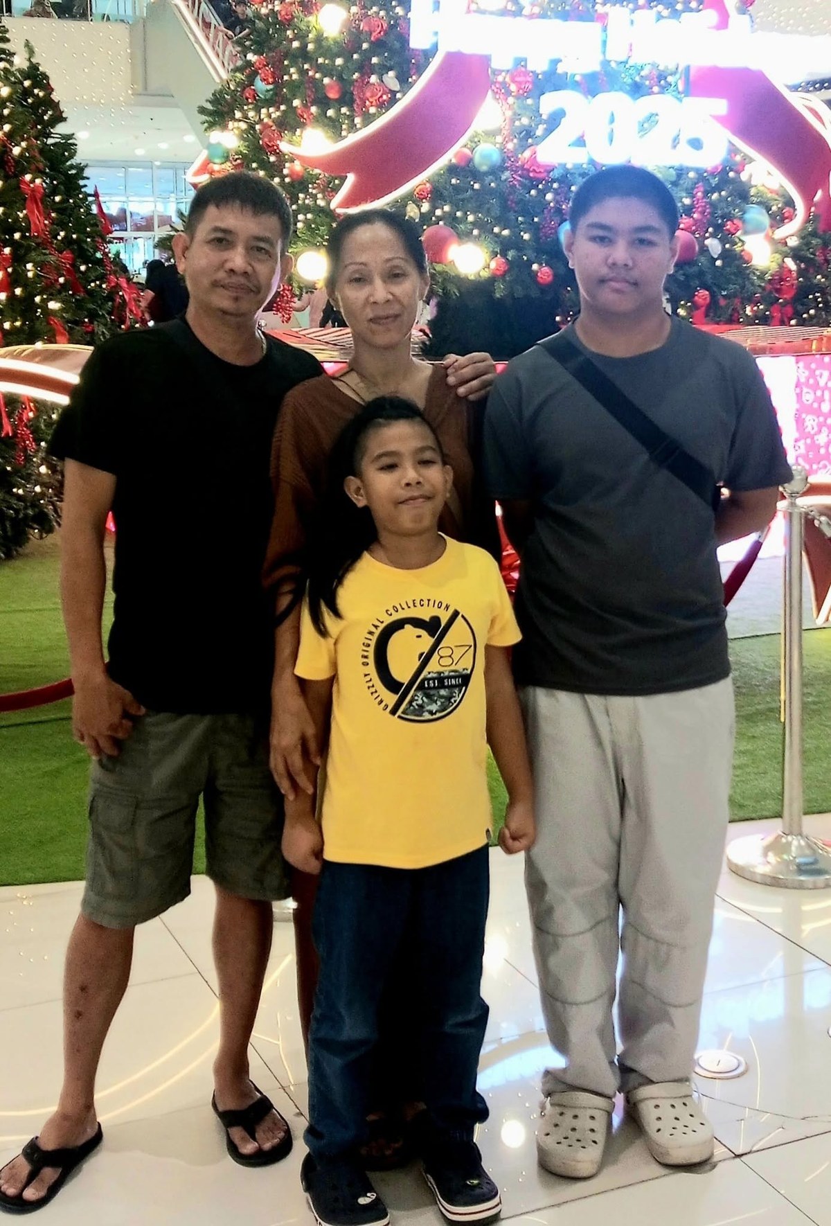 Emelito, Shiela, Alexius, and Zian Penaflor together
